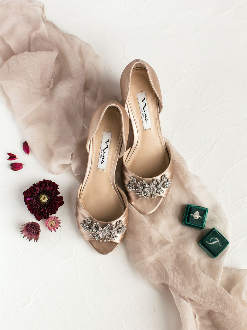 wedding details nina shoes with custom ring box and flowers