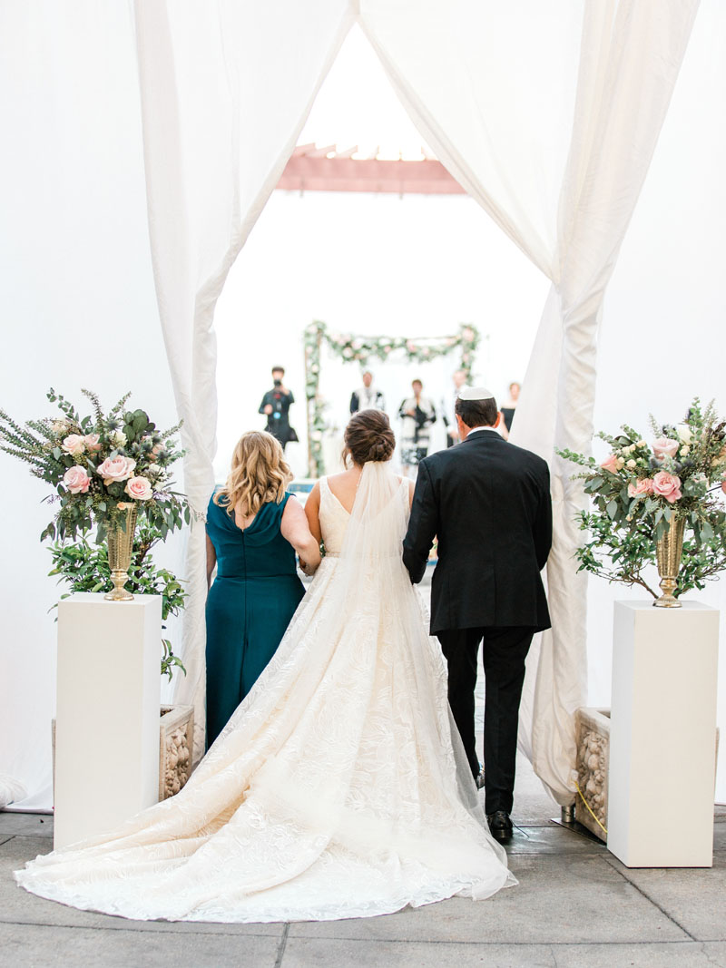 los angeles bride makes her entrance onto the NOOR terrace for the wedding ceremony