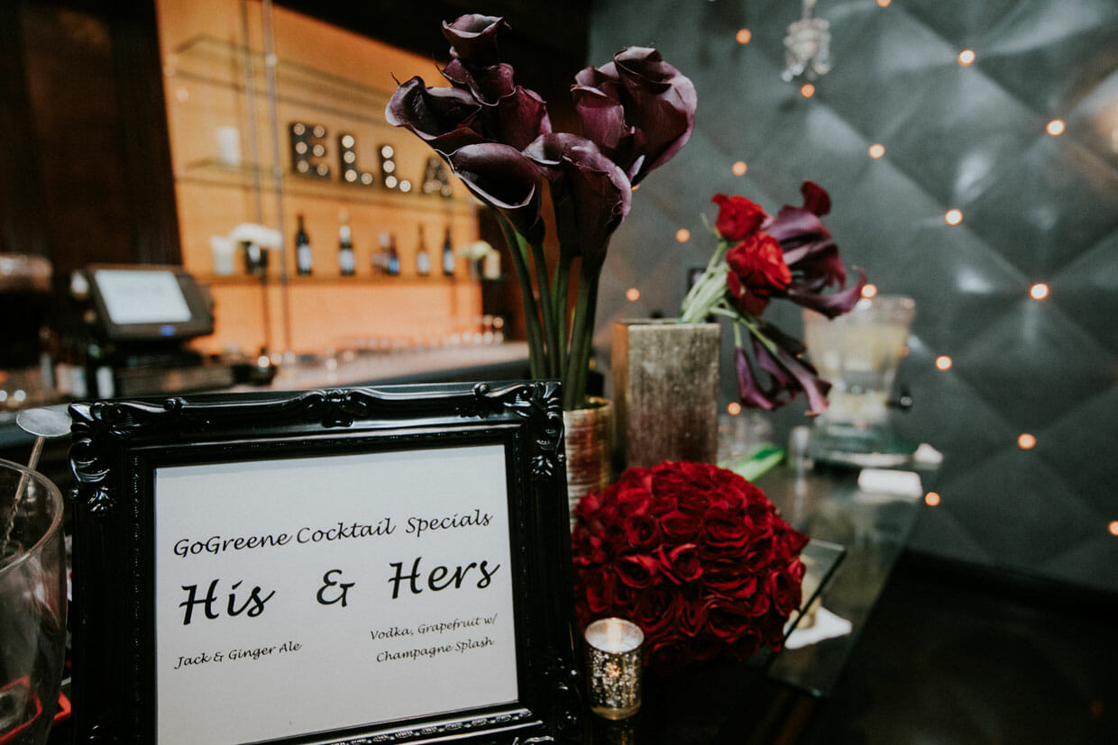 ella banquet hall foyer with alternative wedding flower arrangements in red and black
