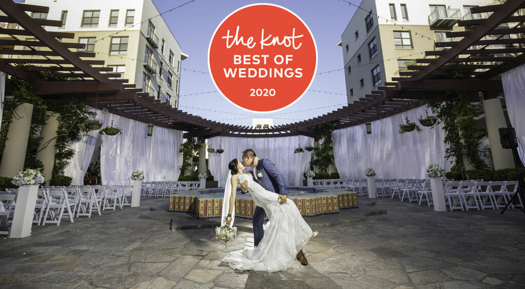 wedding venue awards the knot best of weddings 2020 award with a wedding couple kissing on the NOOR terrace
