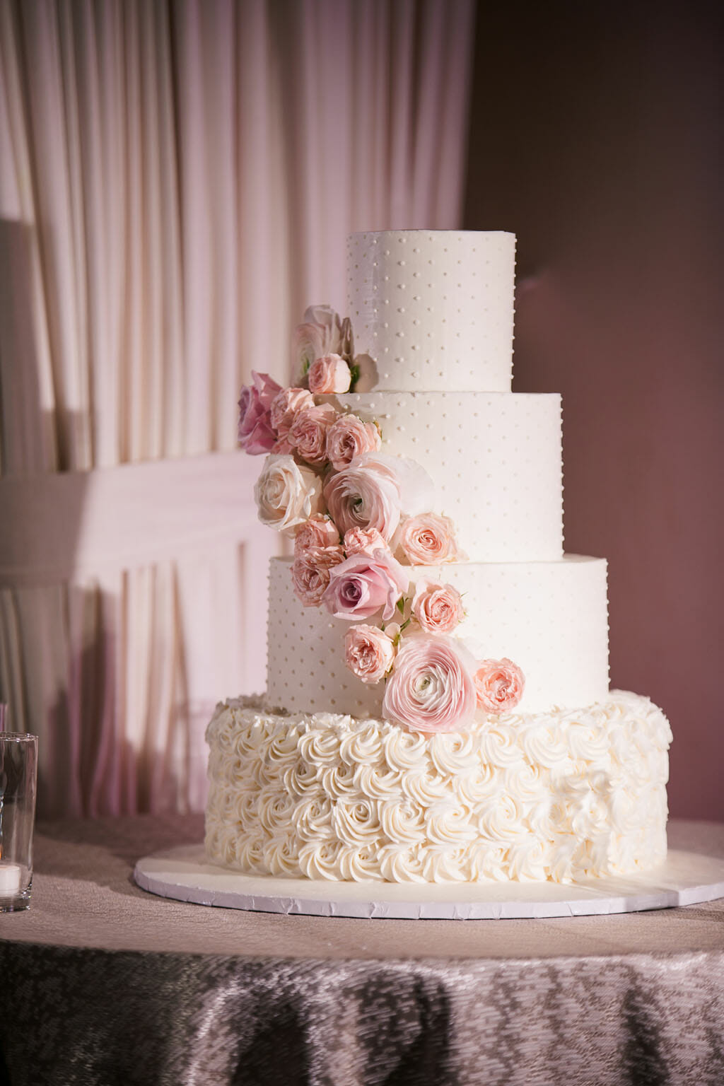 blush wedding cake with floral design