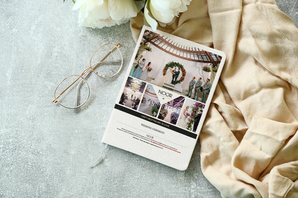 wedding planning flat lay on elegant gray table with noor los angeles wedding packages menu