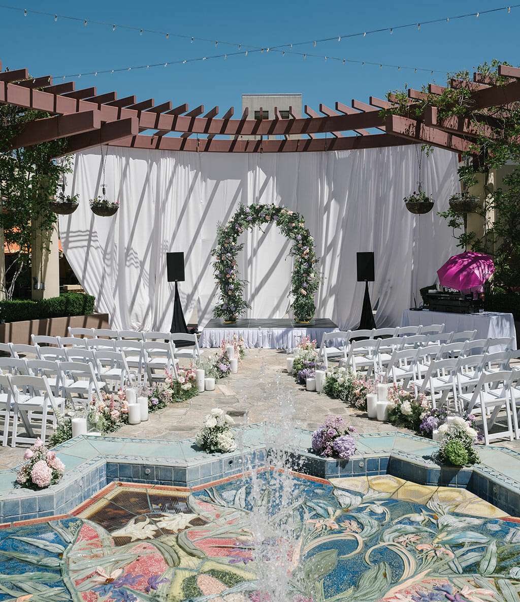 wedding arch and ceremony setup on the noor terrace in pasadena