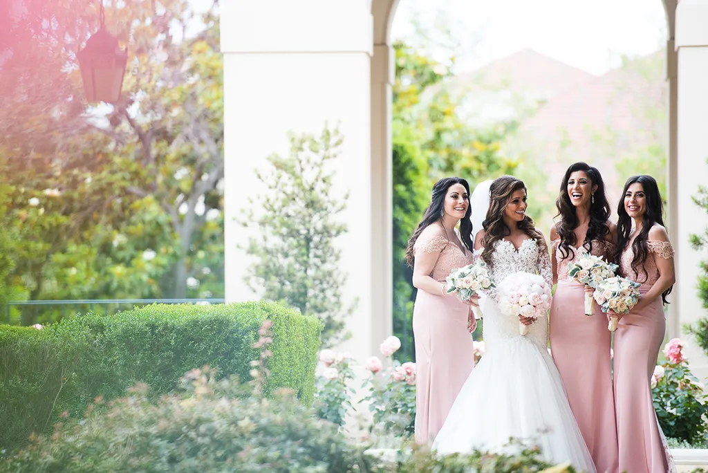 NOOR bride and bridesmaids in the gardens of pasadena city hall