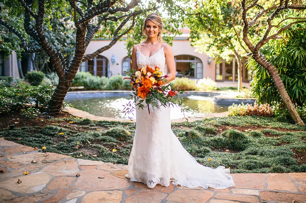 bride photographed in the courtyard at the langham hotel